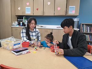 Families complete a project together